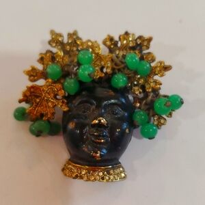 vintage face brooch